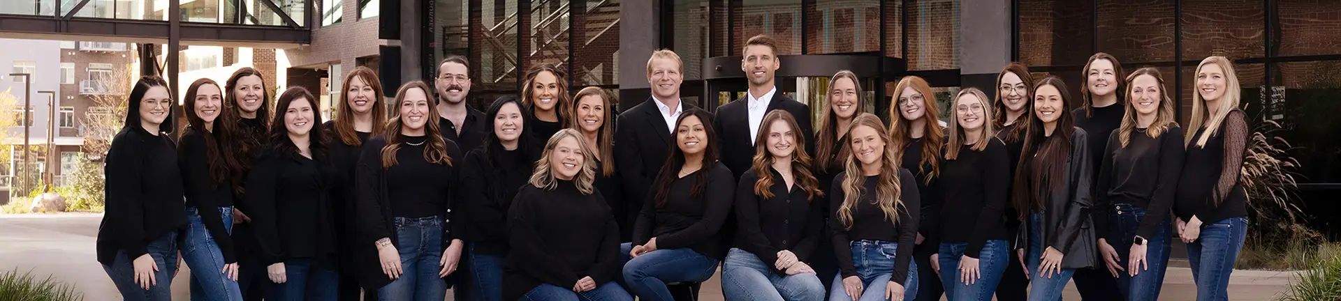 The dedicated and professional team at River Ridge Oral & Maxillofacial Surgical Center posing together, showcasing the friendly and compassionate experts committed to providing exceptional oral surgery care and patient support in Sioux Falls.