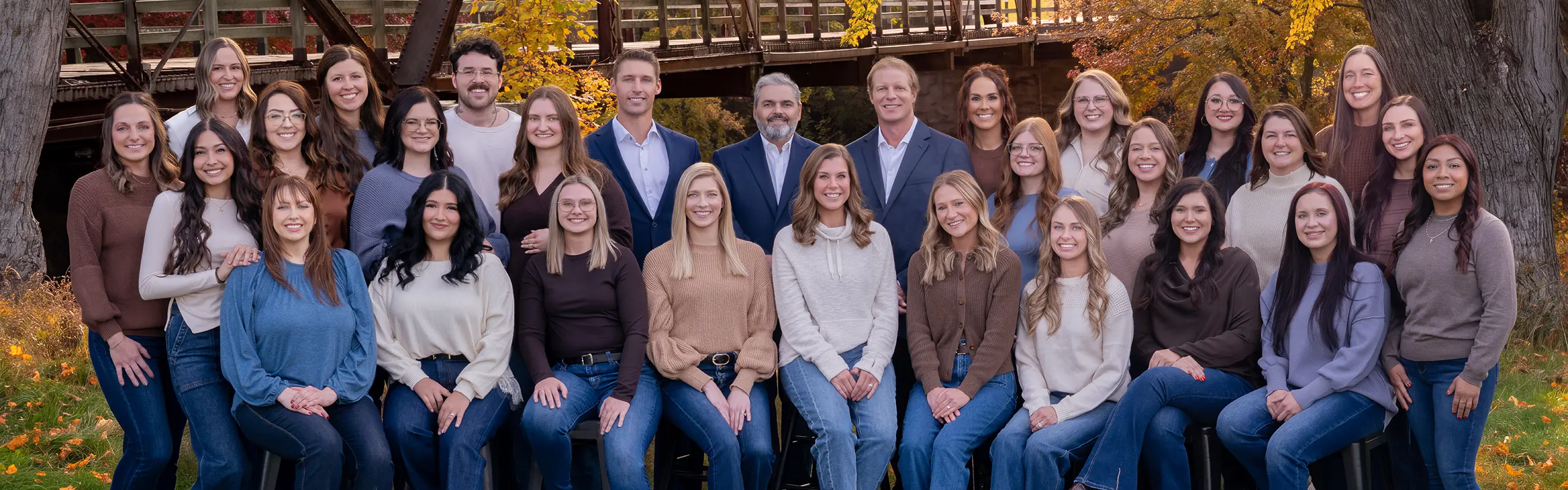 The dedicated and professional team at River Ridge Oral & Maxillofacial Surgical Center posing together, showcasing the friendly and compassionate experts committed to providing exceptional oral surgery care and patient support in Sioux Falls.